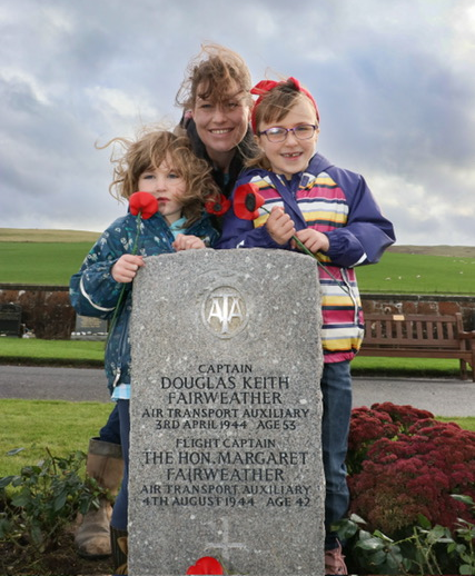 Angela at her grandparents gravestone in Dunure, with her daughters Cora and Matilda.